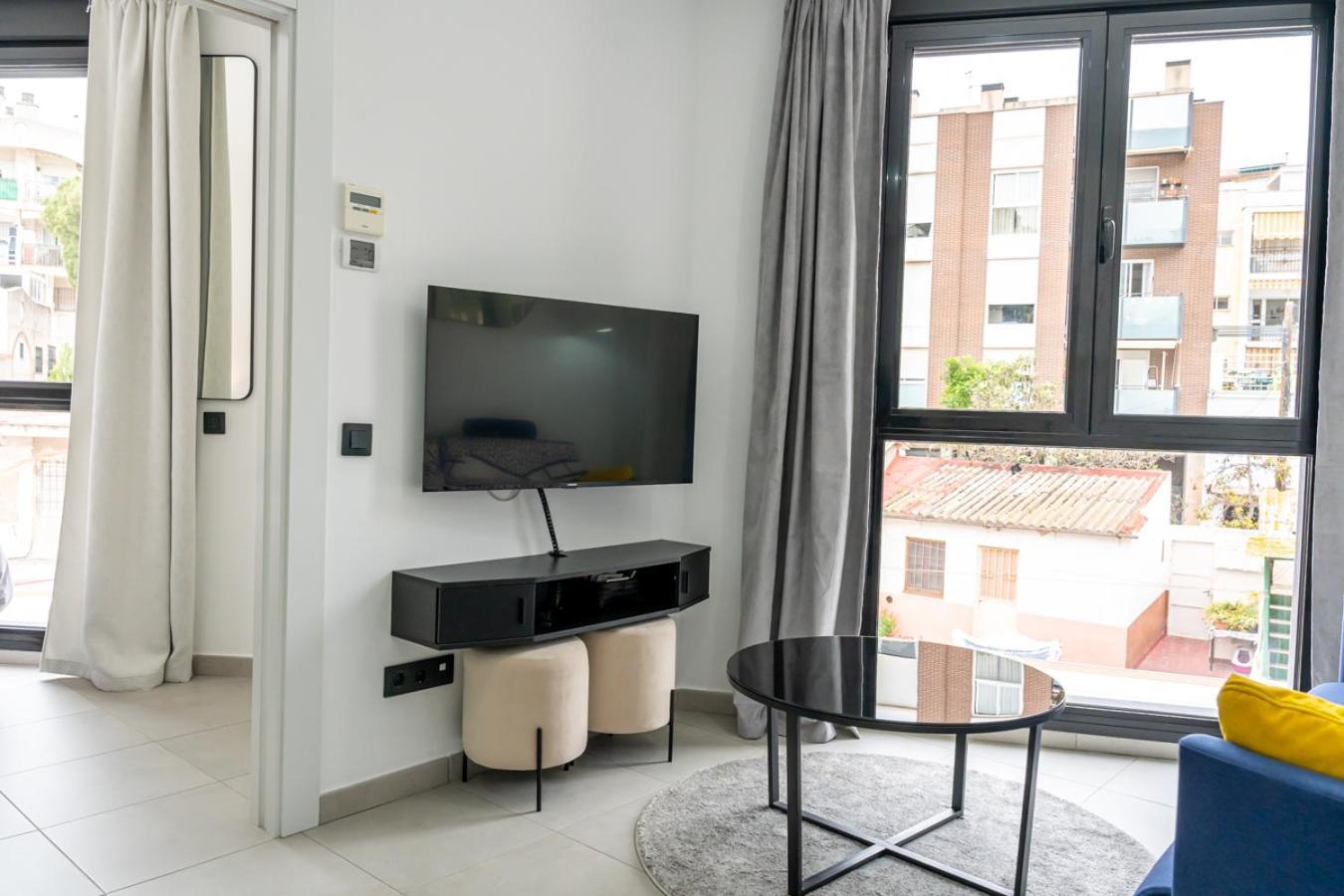 Modern Wave Escape Apartment With Private Parking And Rooftop Pool By Namaste Elite 托雷莫利诺斯 外观 照片