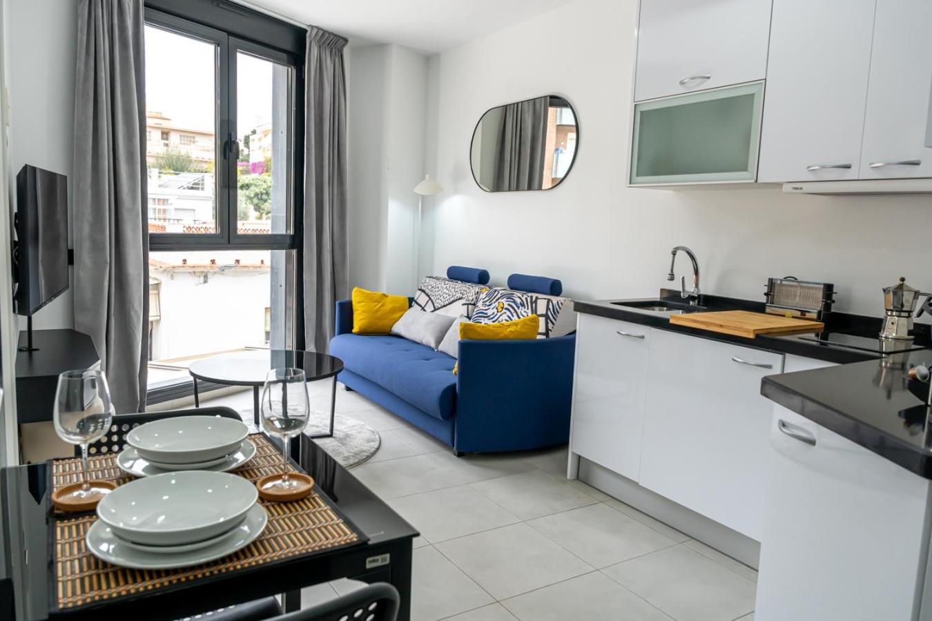 Modern Wave Escape Apartment With Private Parking And Rooftop Pool By Namaste Elite 托雷莫利诺斯 外观 照片