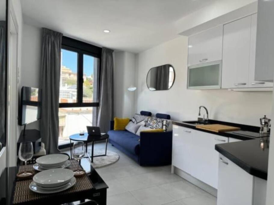 Modern Wave Escape Apartment With Private Parking And Rooftop Pool By Namaste Elite 托雷莫利诺斯 外观 照片